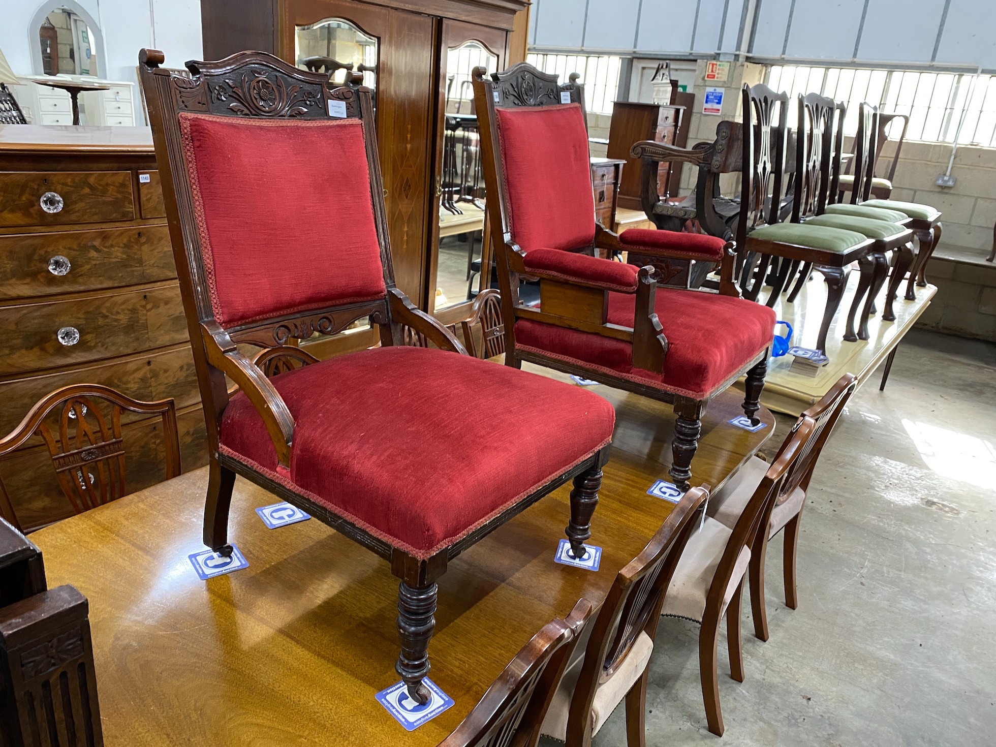 A pair of late Victorian carved mahogany upholstered salon chairs, one with arms, width 70cm, depth 61cm, height 100cm *Please note the sale commences at 9am.